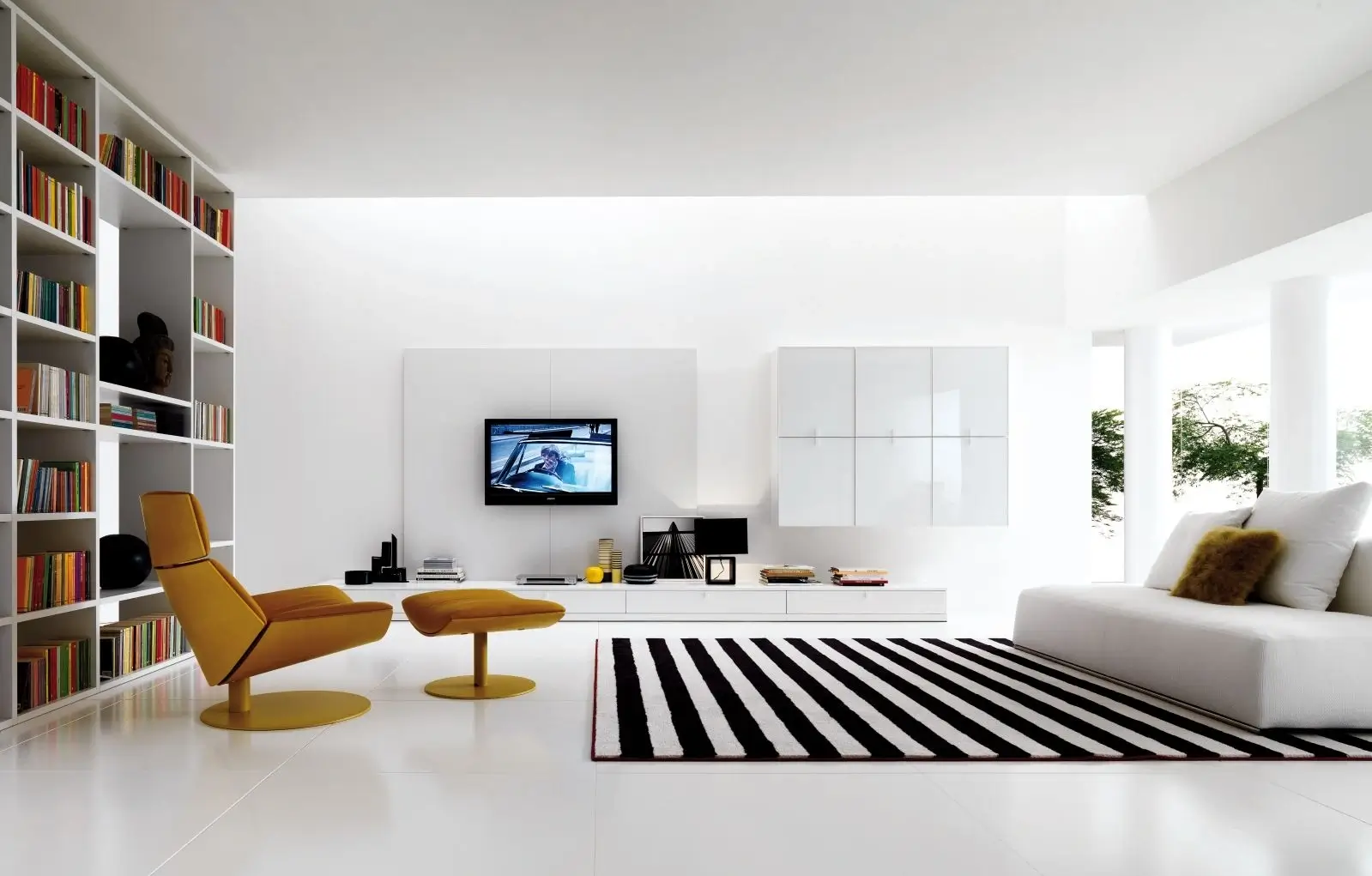 A beautifully designed modern living room with minimalist furniture.