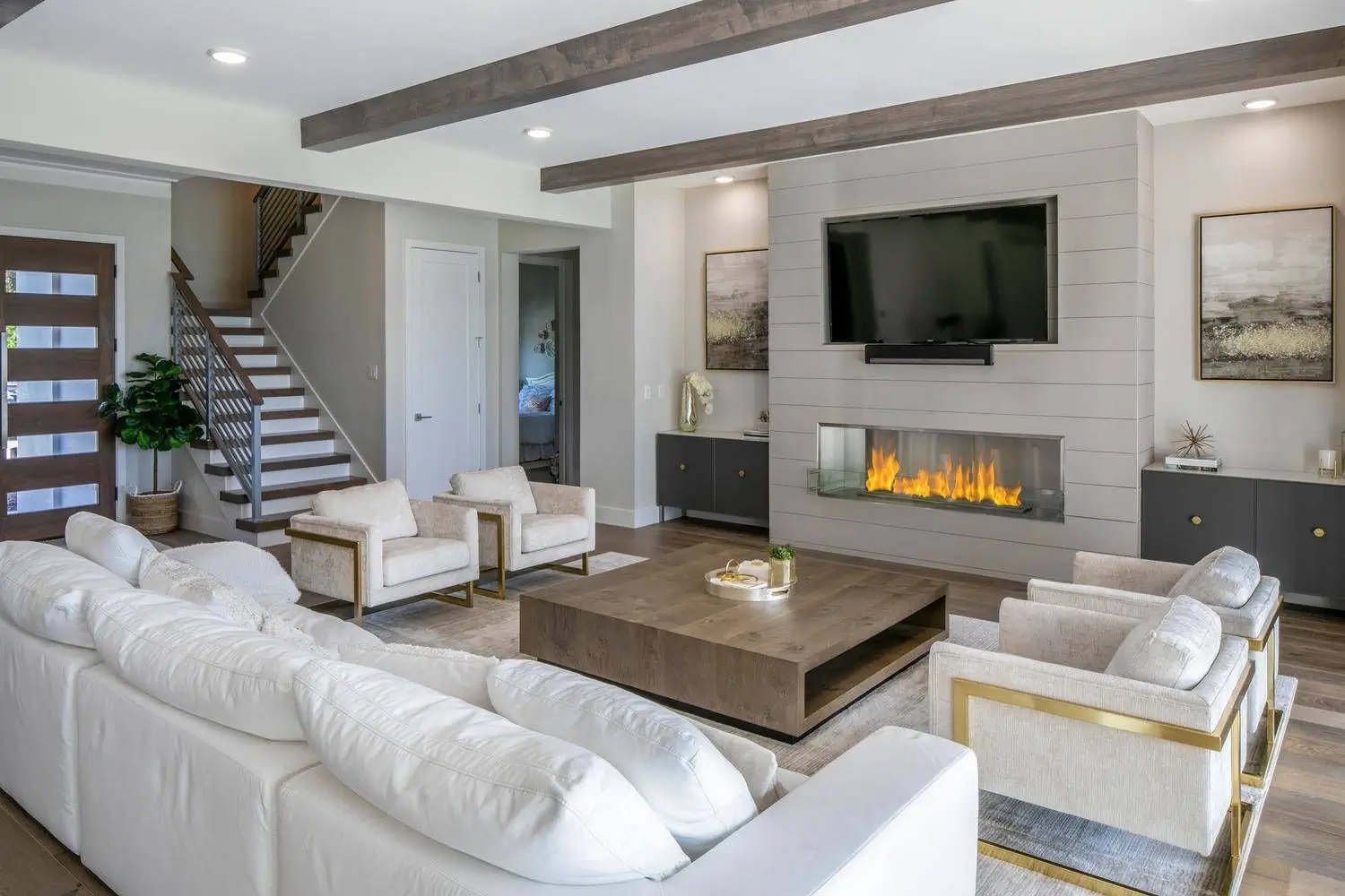 A final photograph of the completed, beautifully furnished living room.
